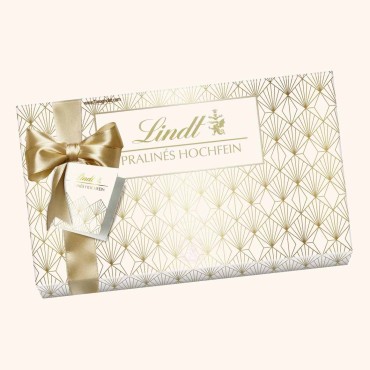 شکلات کادویی لینت مدل پرالین هاشفن طرح کاغذ کادویی 350 گرمی